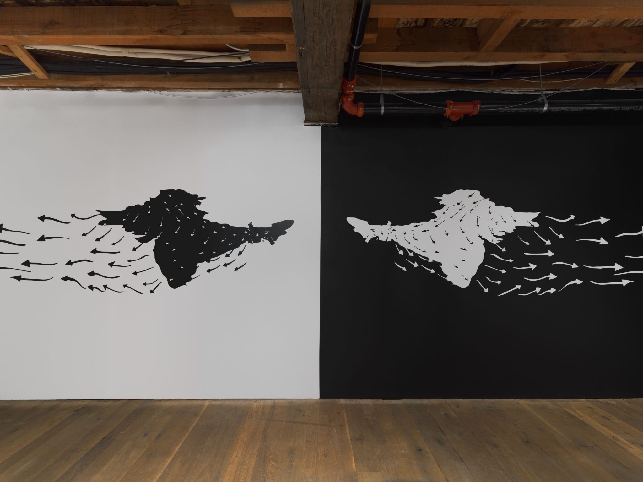 Shot taken from the entrance, middle of the room, Umber Majeed, ‘Made in Trans-Pakistan,’ 2022. Interactive Multimedia Installation: Unity AR Software, Ceramics, Plaster, Wood, Video, and Vinyl. Courtesy of the artist.
