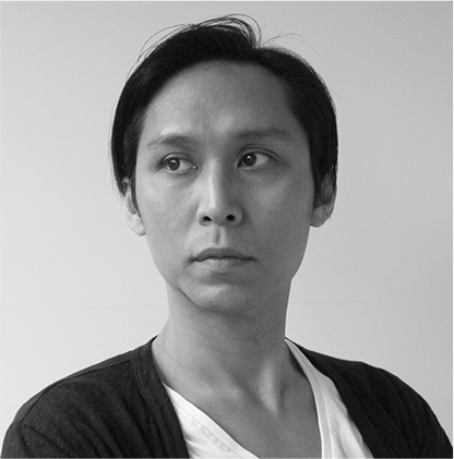 Pictured is artist, Su Hui-Yu, a young-looking mid-40's Taiwanese man with short straight hair parted near the middle.